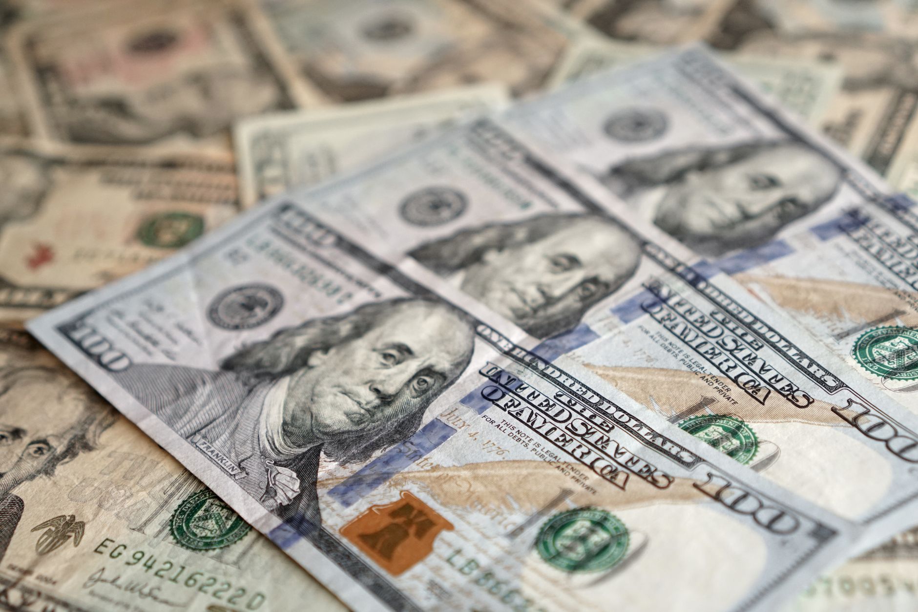 Detailed view of US dollar banknotes showcasing currency and investment themes. — Everything you need to know about NEFT Paym