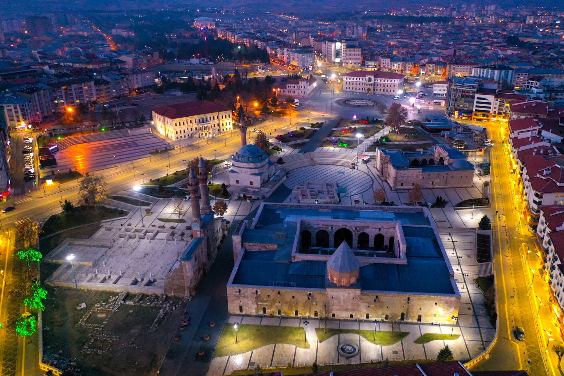 Stunning aerial photograph of Sivas city center illuminated at night, showcasing historic architecture. — What are the benefi