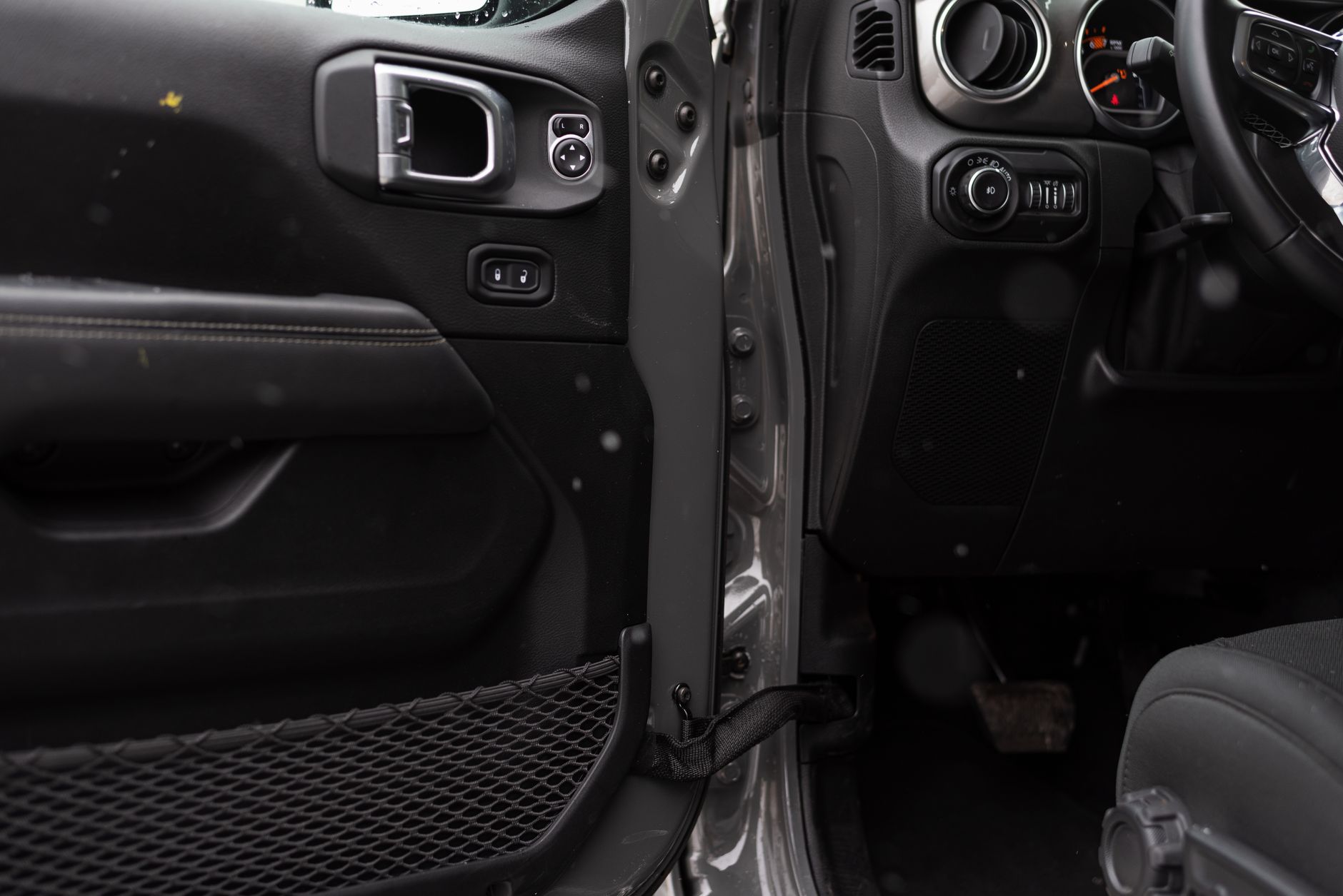 Detailed interior shot of a car showing the door panel and part of the dashboard. — Why crypto wallet is preferred to passwor